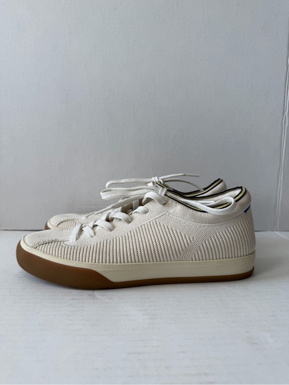 Rothy's Cream Knit Slip-On Sneakers with Navy and Yellow Trim